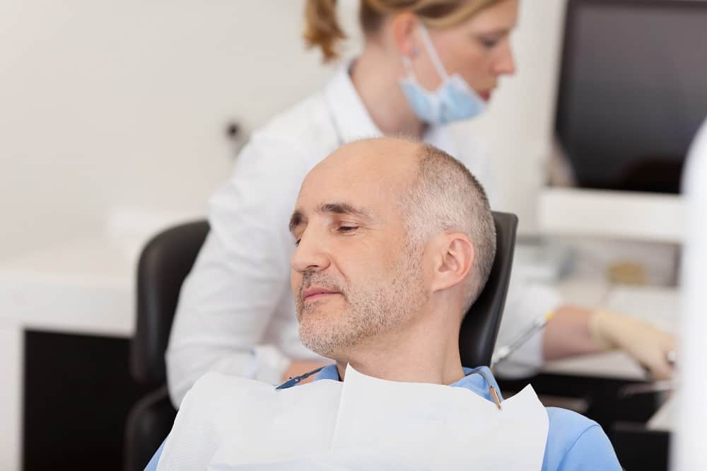 men taking partial dentures treatment