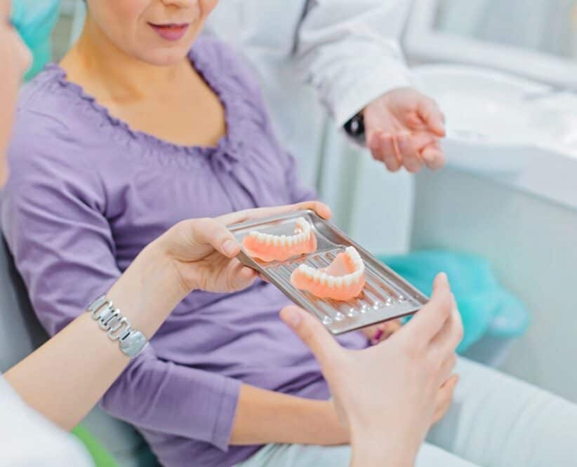 dentist explaining about dentures