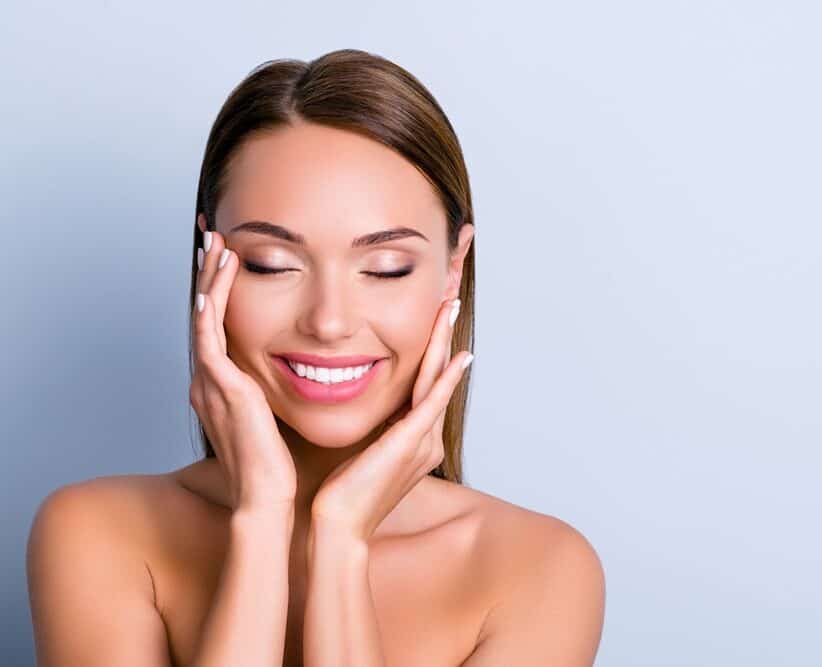 woman smiling after teeth whitening