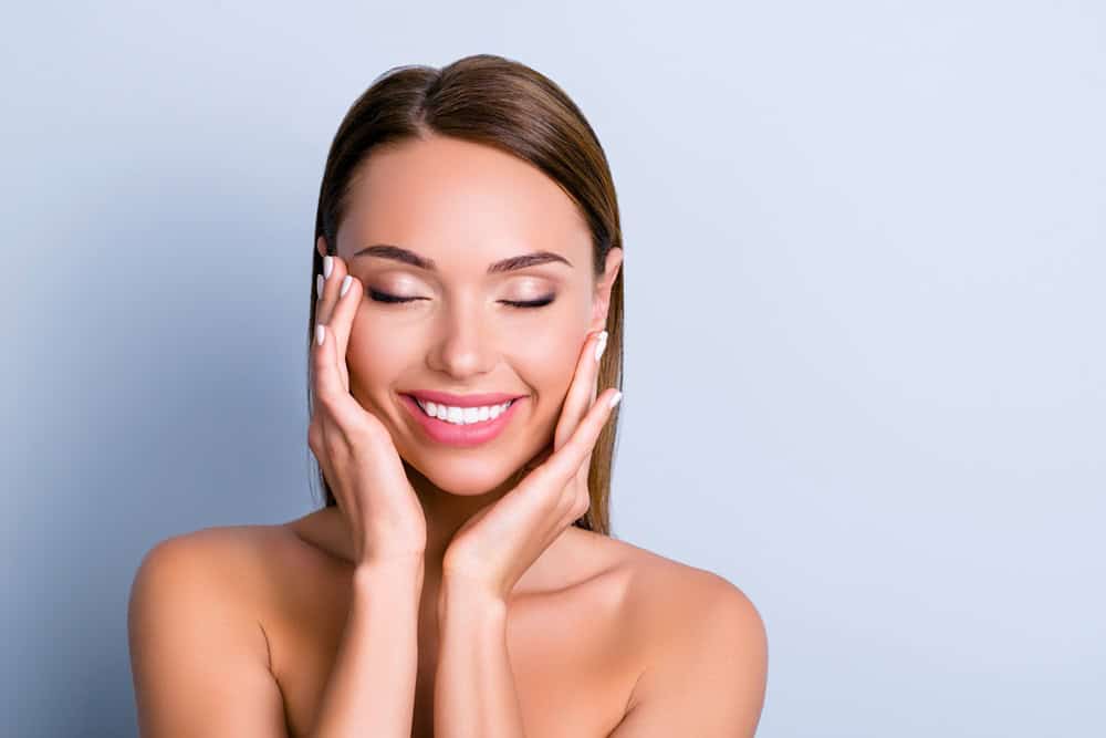 woman smiling after teeth whitening