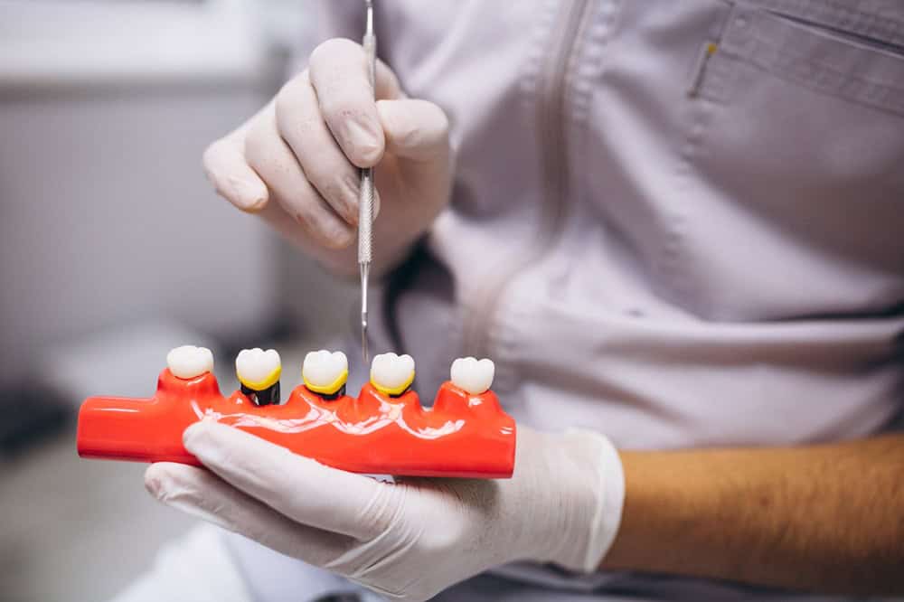 dentist explaining about tooth extraction